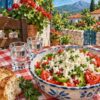 Картина шопска салата и ракия: купа със салата, две чаши и хляб на карирана покривка в двор
